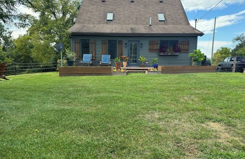 Carlisle Cabin | Charming cabin nestled in 30 secluded acres ready for your next adventure!