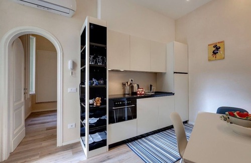 Le Cure Apartment | Cozy Terrace Retreat Steps from the City Center