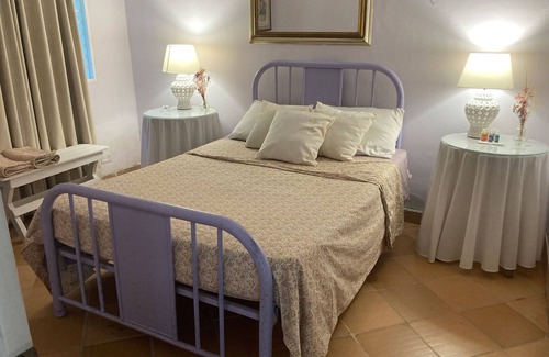 Minca Other | Vibrant Color Rooms with Spa and Kitchen Access
