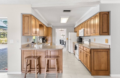 Cypress Lakes Estates House | Cozy Retreat with Heated Pool & Ocean View - Rated 9.4/10