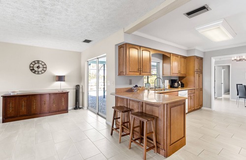 Cypress Lakes Estates House | Cozy Retreat with Heated Pool & Ocean View - Rated 9.4/10