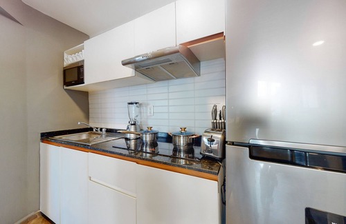 Downtown Cancun Hotel | Inviting Condo with Pool, Kitchenette, and Balcony Access