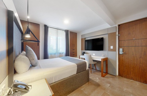 Downtown Cancun Hotel | Inviting Condo with Pool, Kitchenette, and Balcony Access