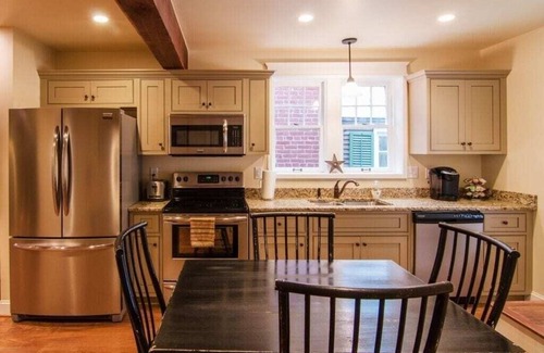 St. Charles House | Historic St. Charles Cottage with Jetted Tub & Fireplaces
