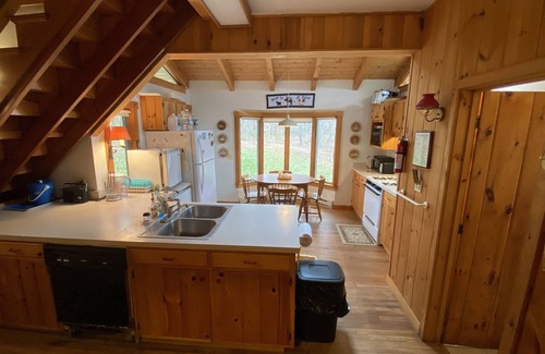 Weld House | Inviting Cottage with Deck and Scenic Lakefront Views