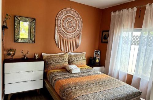 City Heights House | Charming Cottage with Hot Tub in Secret Garden