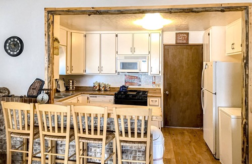 Alpine Village Cabin | Inviting Dog-Friendly Mountain Retreat with Hot Tub & Views