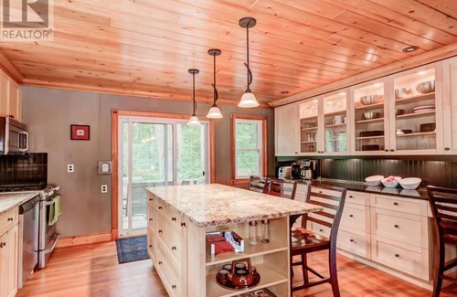 Grand Bend Cottage | Family Cottage Steps from Beach with Pool & Ocean Views