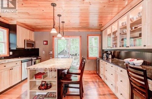 Grand Bend Cottage | Family Cottage Steps from Beach with Pool & Ocean Views