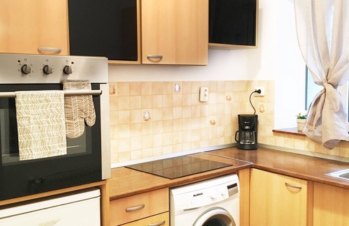 Centrul Vechi Apartment | Cozy Fireplace Apartment with Kitchen & Child-Friendly Perks