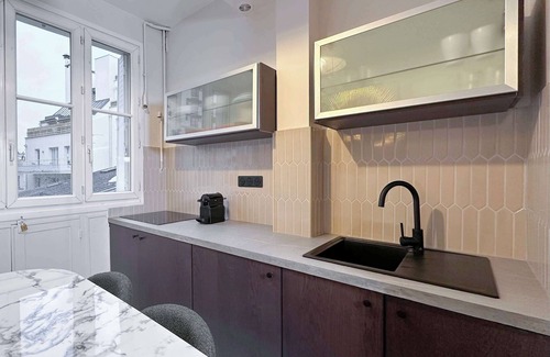 15th Arrondissement Apartment | Cozy Flat Steps from the Eiffel Tower with Spa & Kitchen