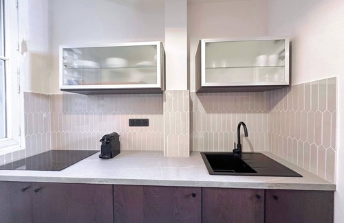 15th Arrondissement Apartment | Cozy Flat Steps from the Eiffel Tower with Spa & Kitchen