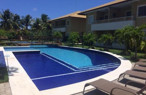 Centro Apartment | Relaxing Guarajuba: Oceanfront Stay with Pool & Family Fun