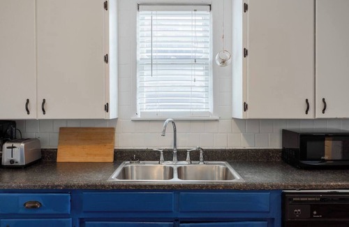 West Plaza House | Discover a Cozy Retreat Close to Dining and Entertainment