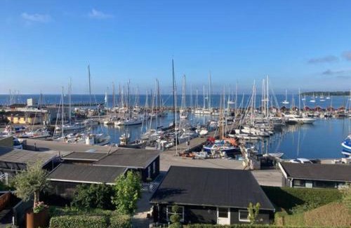 Rødvig House | Inviting Harbourfront Holiday Home with Ocean View