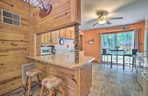 Prudenville Cottage | Pet-Friendly Houghton Lake Cottage with Spa & Backyard Access