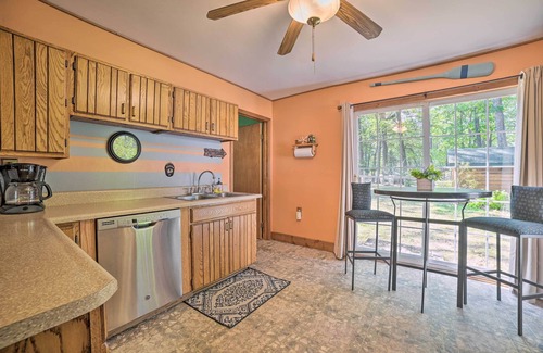 Prudenville Cottage | Pet-Friendly Houghton Lake Cottage with Spa & Backyard Access