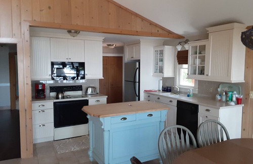 Traverse City Cottage | Idyllic Lake Leelanau Cottage with Ocean and Lake Views