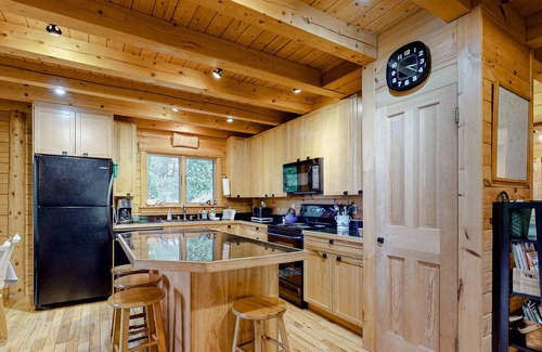 Boothbay Cabin | Charming, Lakefront Cabin with a Fireplace, Wood Stove, Kayaks, & Sandy Beach