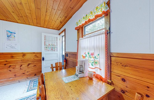 Indian River Cottage | Inviting Lakefront Cottage with Dock and Fire Pit