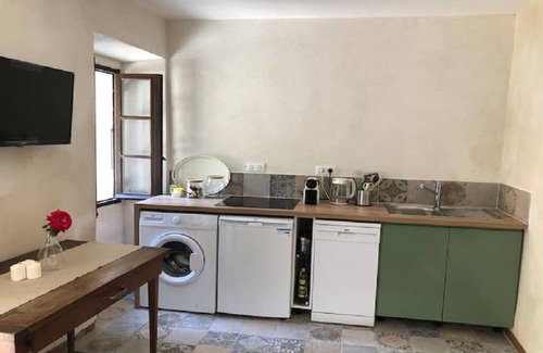 Nonza Apartment | Serene Garden Apartment with Ocean View in Village Center
