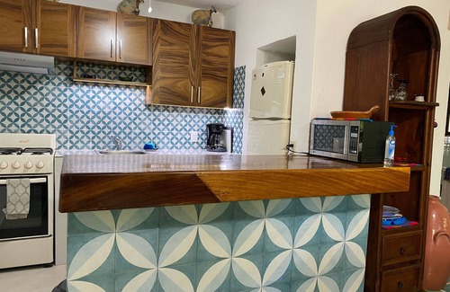 North Hotel Zone Condo | Beachfront Mexican Condo with Pool & Spa – Rated 10/10!