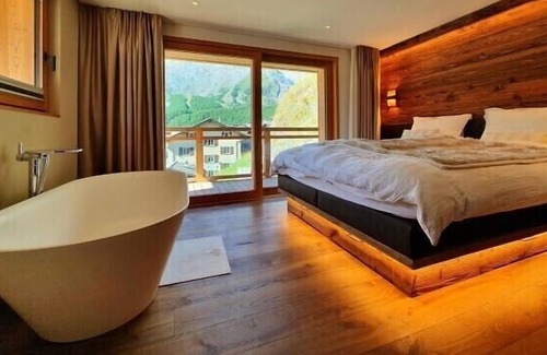Saas-Fee Ski Chalet | Idyllic Chalet Engedi: Glacier Views & Spa Retreats Await