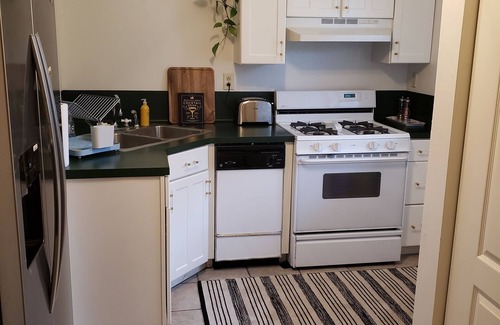 Mid City South House | Cozy Goodwood Suite with Ocean View & Spa Amenities