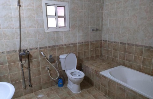 Al Wakrah House | Inviting Private Room with Shared Bath for Your Stay