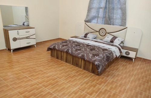 Al Wakrah House | Inviting Private Room with Shared Bath for Your Stay
