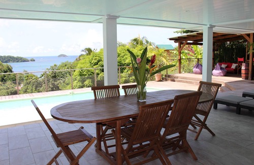 Tartane Apartment | Cozy Trinidad Rental with Ocean View, Pool & High Ratings