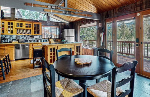 Gold Bar House | Charming riverfront cabin with hot tub, deck, mountain views and W/D