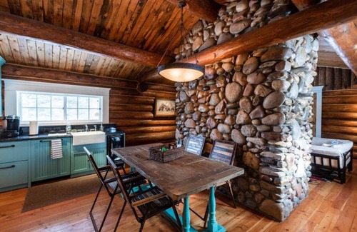 Bondurant Cabin | Experience Rustic Cabin Bliss by the River - Top-Rated Stay!