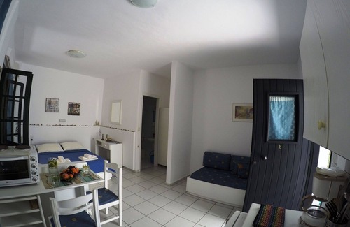 Kokkini Chani Apartment | Cozy Studio for 1-3 Guests, Steps from Kokkini Hani Beach