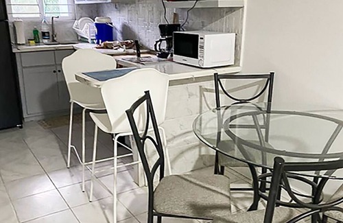 Hellshire Apartment | Relaxing Tropical Beach Suite with Spa and Family Amenities