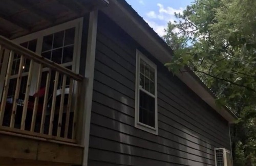 Clarksville Cabin | Charming waterfront barndominium on the beautiful spring-fed Chipola River.
