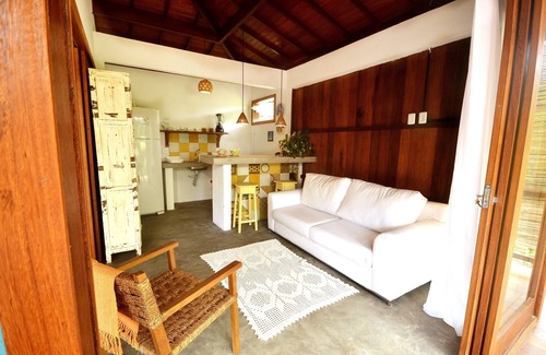 Barra Grande House | Escape to the Yellow Bungalow on Algodões Beach Today