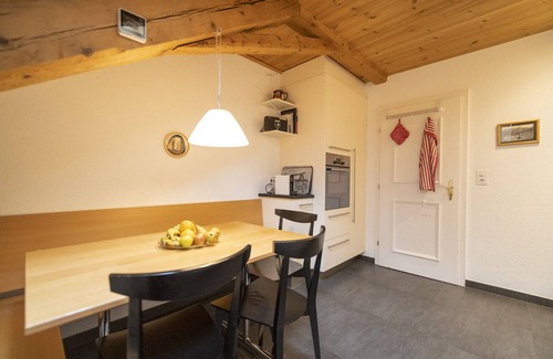 Engadin Scoul Apartment | Stunning Rooftop Flat with Panoramic Views in Ftan