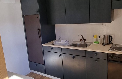 Vna Apartment | Chasa Rosa 1: Cozy Apartment in Sunny Mountain Village
