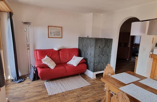 Vna Apartment | Chasa Rosa 1: Cozy Apartment in Sunny Mountain Village
