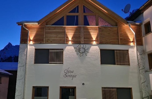 Ravaisch Apartment | Pet-Friendly Retreat at Chasa Siringia EG - Rated 9/10