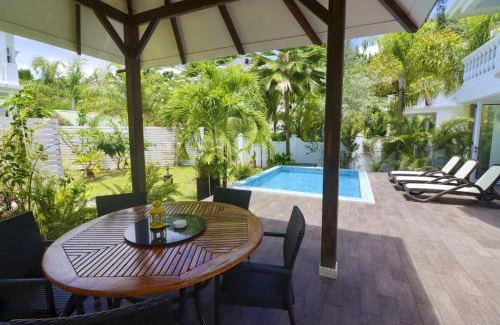 Beau Vallon Villa | Elegant Chateau Elysium: Oceanfront Two-Bedroom Villa