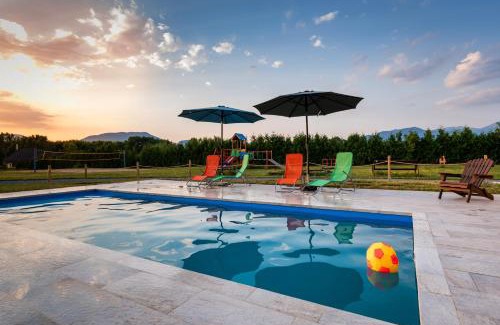 Liptovsky Mikulas Ski Chalet | Relax at Chaty Mara: 4-Star Oceanfront Retreat