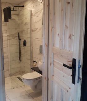 Bobrka Cabin | Pet-Friendly Escape at CHATY TRZY with Pool & Family Amenities