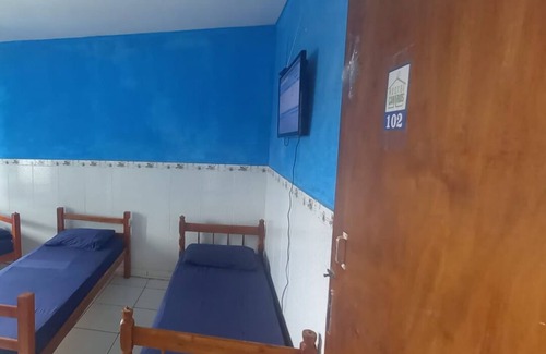 Palhoca Hotel | Budget-Friendly Stay at Hostel Canários - Pet & Child Friendly