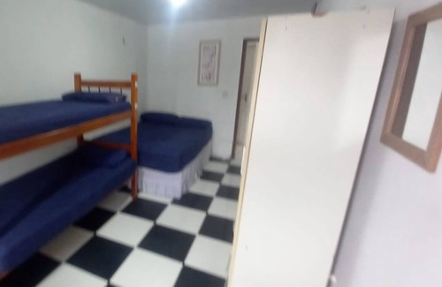 Palhoca Hotel | Budget-Friendly Stay at Hostel Canários - Pet & Child Friendly