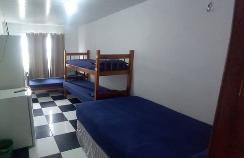 Palhoca Hotel | Budget-Friendly Stay at Hostel Canários - Pet & Child Friendly