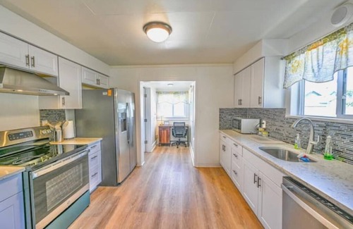 Tillamook House | Bright 2 Bedroom Retreat with Hot Tub and Family-Friendly Perks
