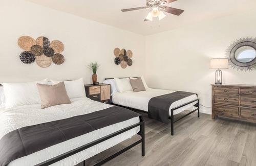 Peacock Village House | Cheerful 2 Bedroom/2 Bath home w 2 Car Garage - Sleeps 6. Community Pool