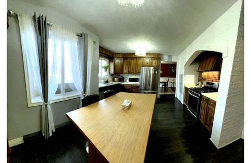 Algoma District House | Inviting 4-Bedroom Retreat with Pool and Spa Amenities